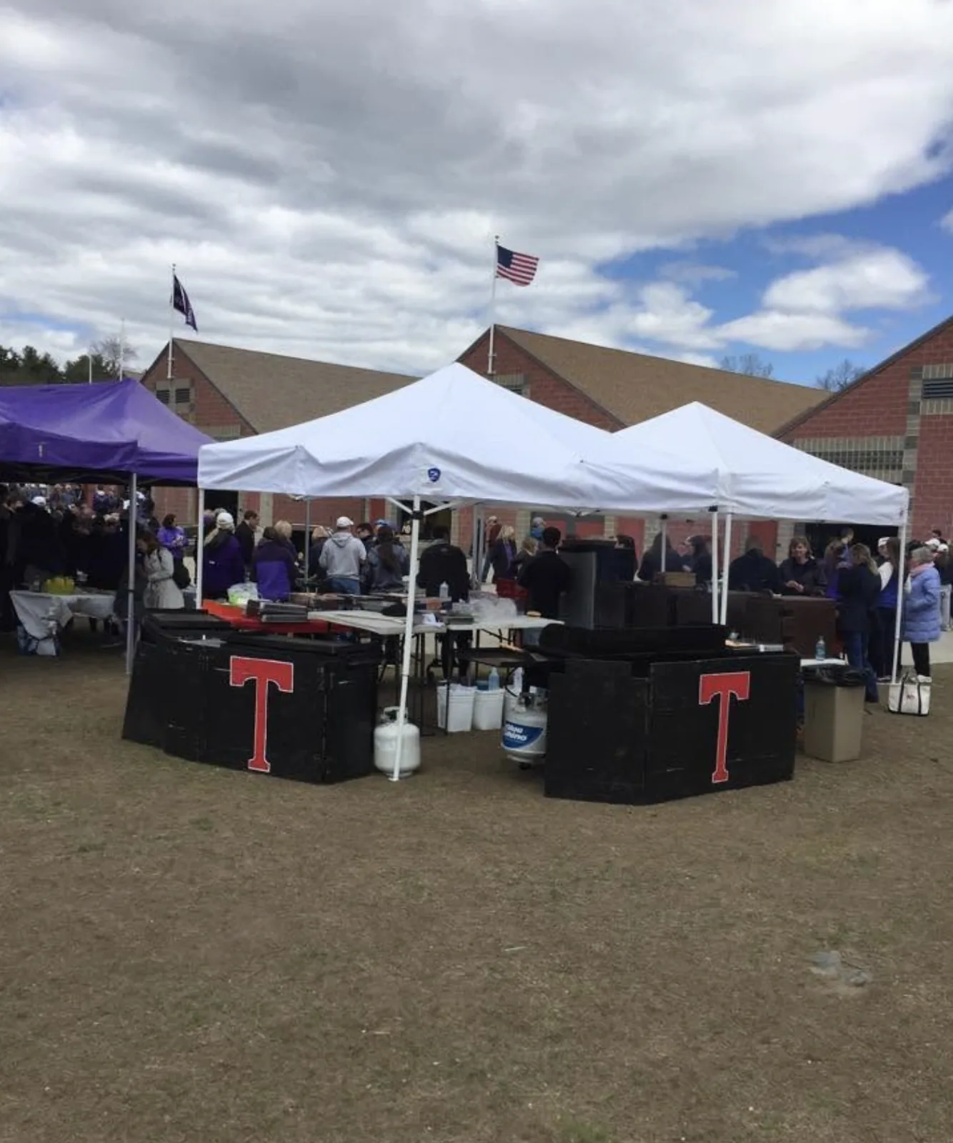 Game-day tailgate, grills fired up